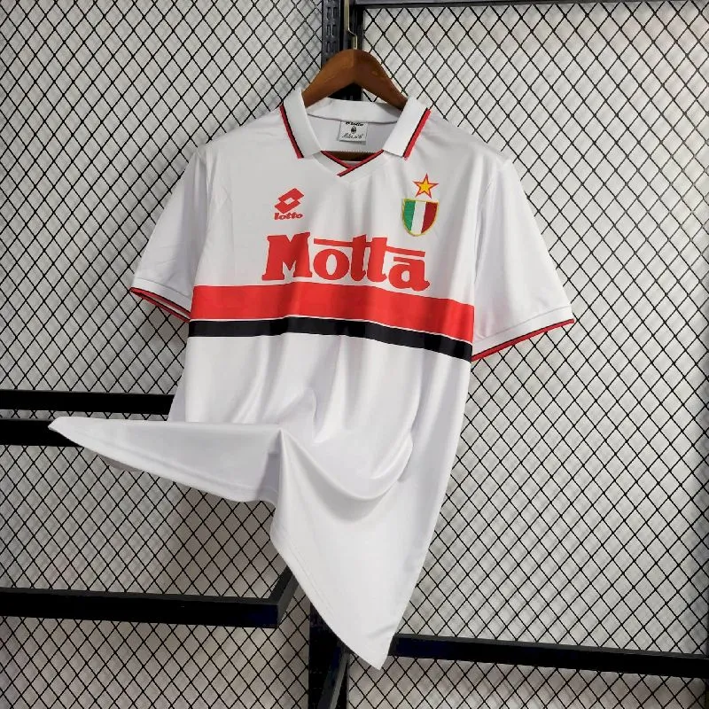 0926a2a6b9f8ec572dd78a4fa9e8c6a3.webp Retro AC Milan 1992/94 Away Jersey - Image 1