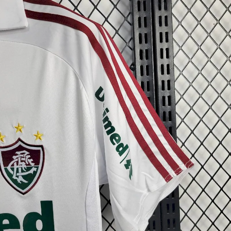 f88e9c7c7b67ec52e3a65f1e65430d05.webp Retro Fluminense 2010 Away Jersey - Image 4